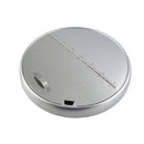 Round metal lid with recessed handle slot and diagonal indicator strip